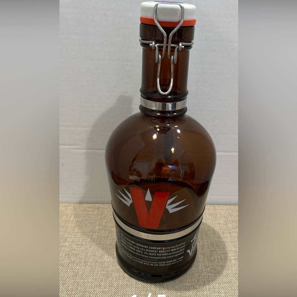 1 Victory Brewing Co. 2 L Growler Brown Glass W/Metal Banded Handle  Ceramic Lid